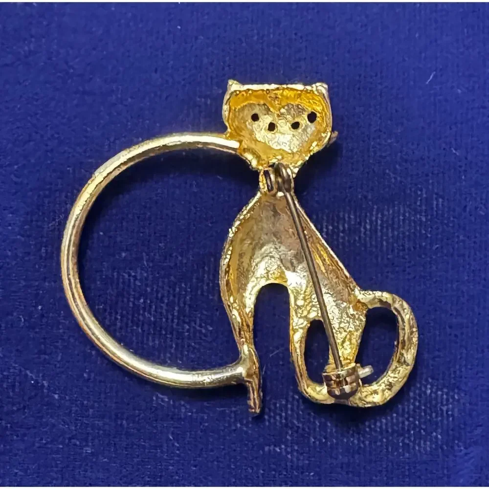 Vintage MCM gold tone cat eyeglass holder pin brooch